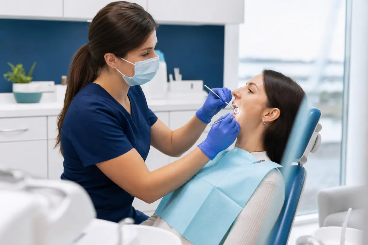 Dentist performing a gentle oral cancer screening in Port Dover