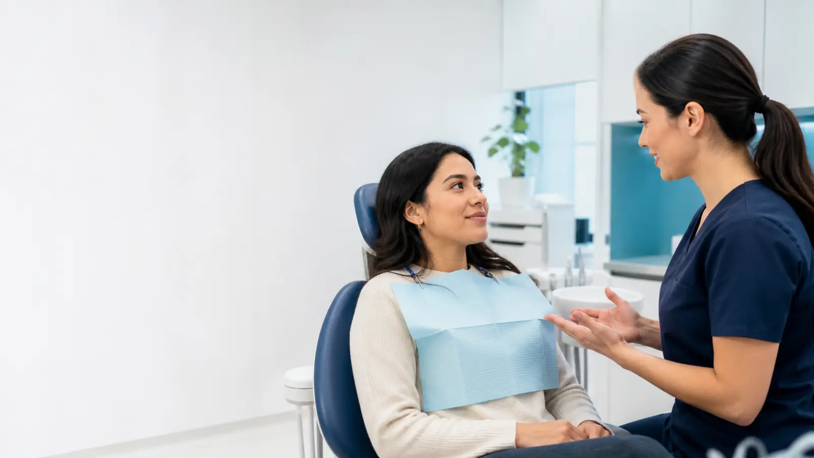 Dental professional calmly assisting a patient with an urgent dental concern in Port Dover