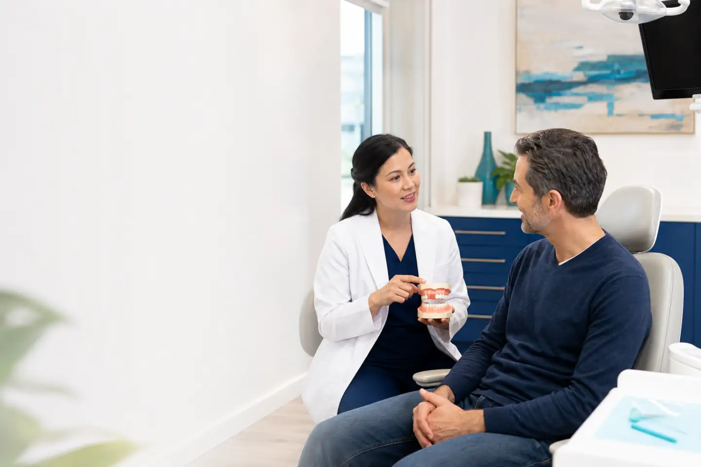 Patient discussing nitrous oxide minimal sedation with a dentist